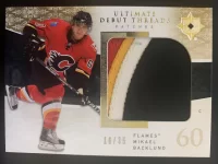 2009-10 Ultimate Collection Debut Threads Patch Mikael Backlund #16 of 35.webp