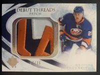 2010-11 Ultimate Collection Debut Threads Patch Nino Niederreiter #35 of 35.webp