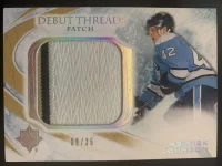 2010-11 Ultimate Collection Debut Threads Patch Nick Johnson #9 of 35.webp