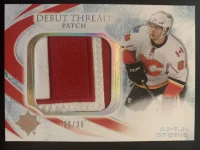 2010-11 Ultimate Collection Debut Threads Patch T.J. Brodie #32 of 35.webp