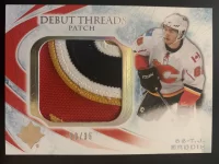 2010-11 Ultimate Collection Debut Threads Patch T.J. Brodie #33 of 35.webp